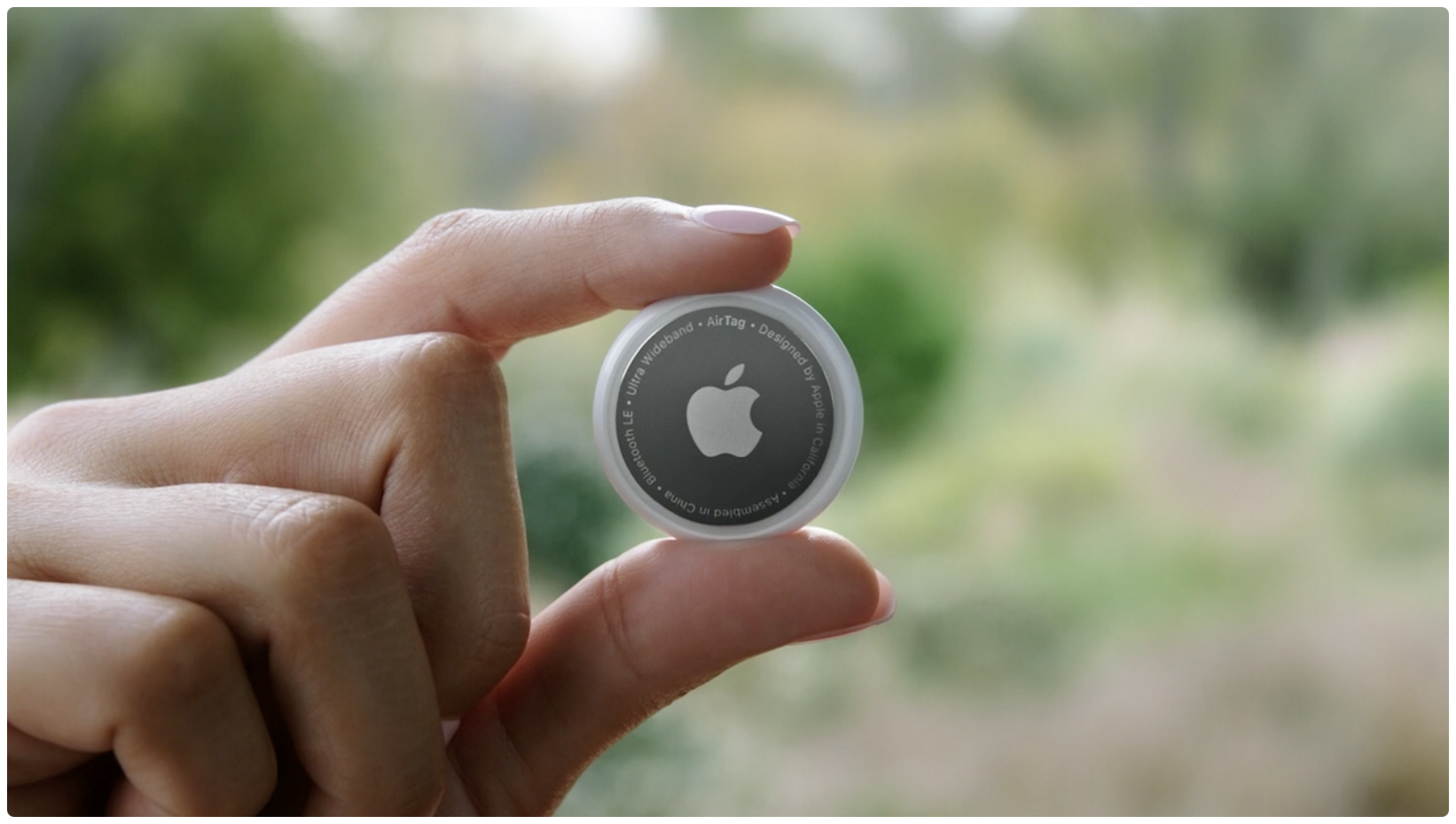 Apple's promotional image for the AirTag personal item tracker