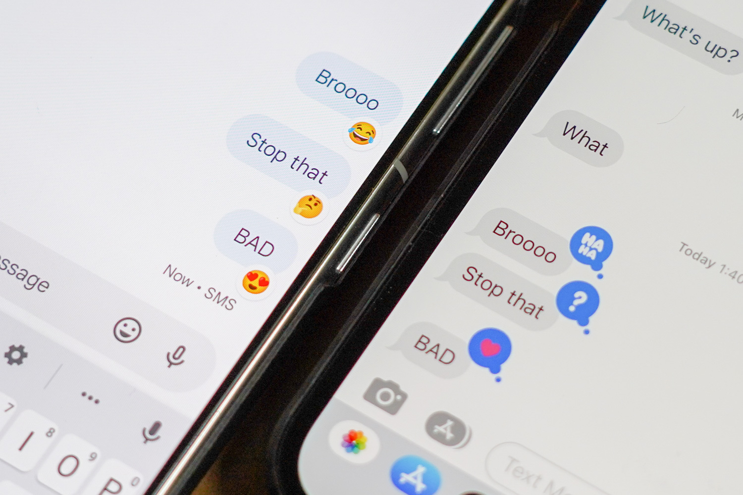 An image showing an Android phone and an iPhone side by side with Google Messages interpreting iMessage Tapback reactions as emoji characters