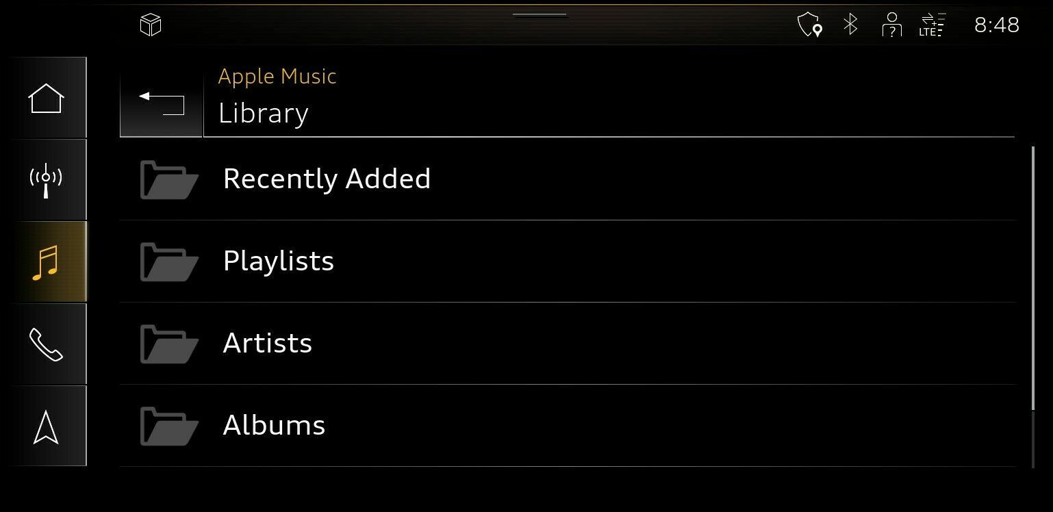 Apple Music's native integration in Audi's 2022 models is showcased in this press photo, with the Library section displayed on a car's Multi-Media Interface screen
