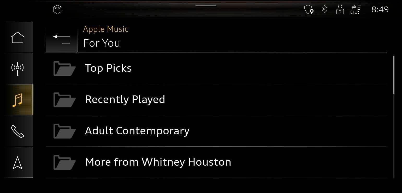 Apple Music's native integration in Audi's 2022 models is showcased in this press photo, with the For You section displayed on a car's Multi-Media Interface screen