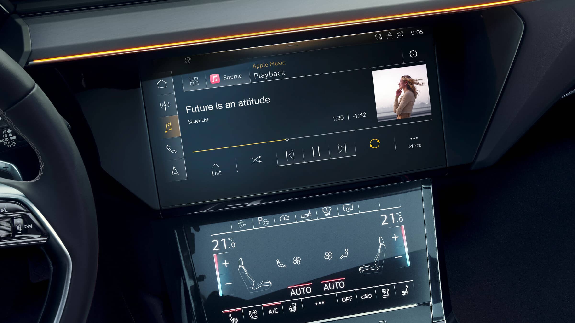 Apple Music's native integration in Audi's 2022 models is showcased in this press photo, with the Now Playing interface displayed on a car's Multi-Media Interface screen