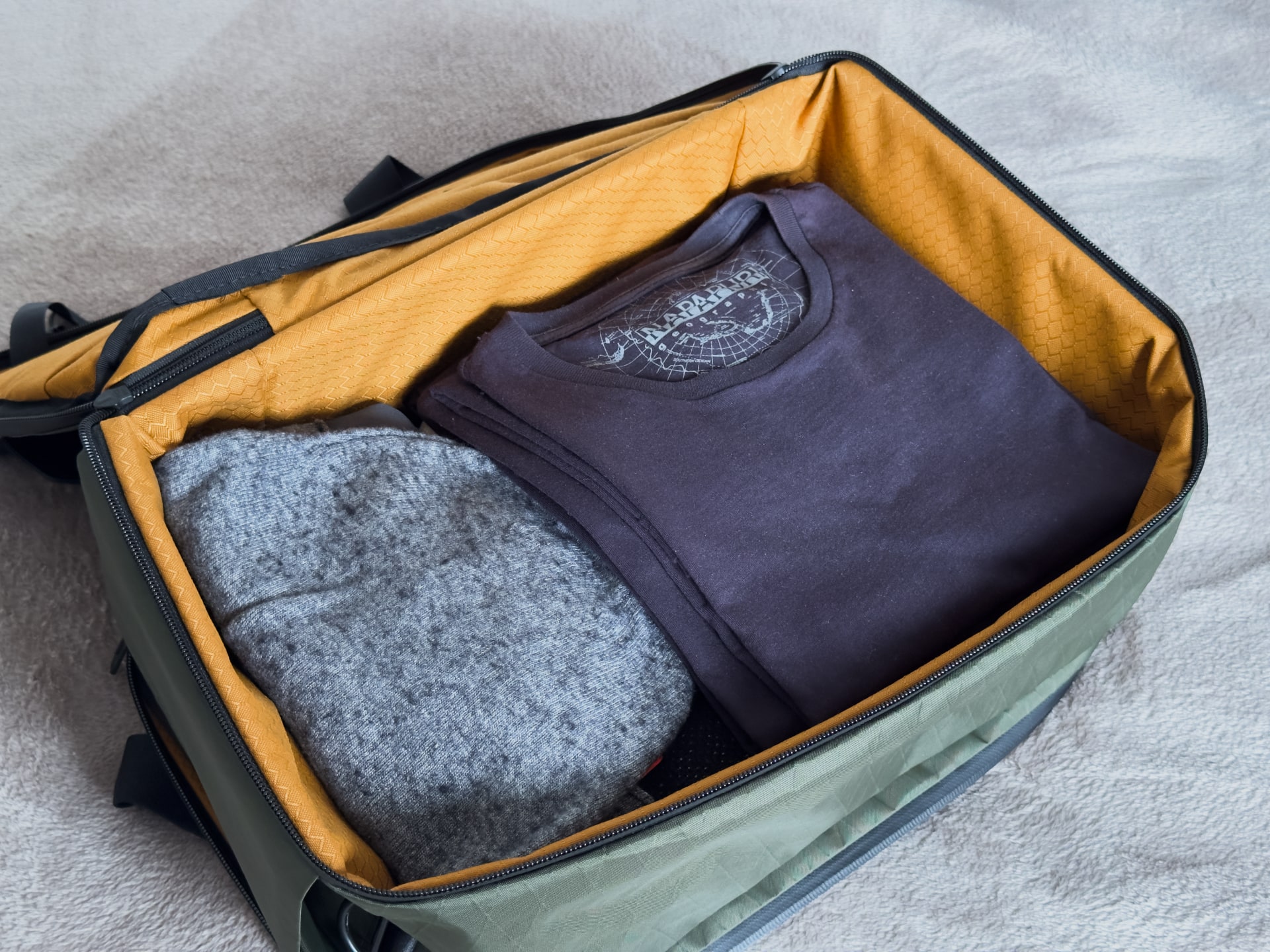 Wardrobe in the clothing compartment of Waterfield's X-Air Duffel travel bag