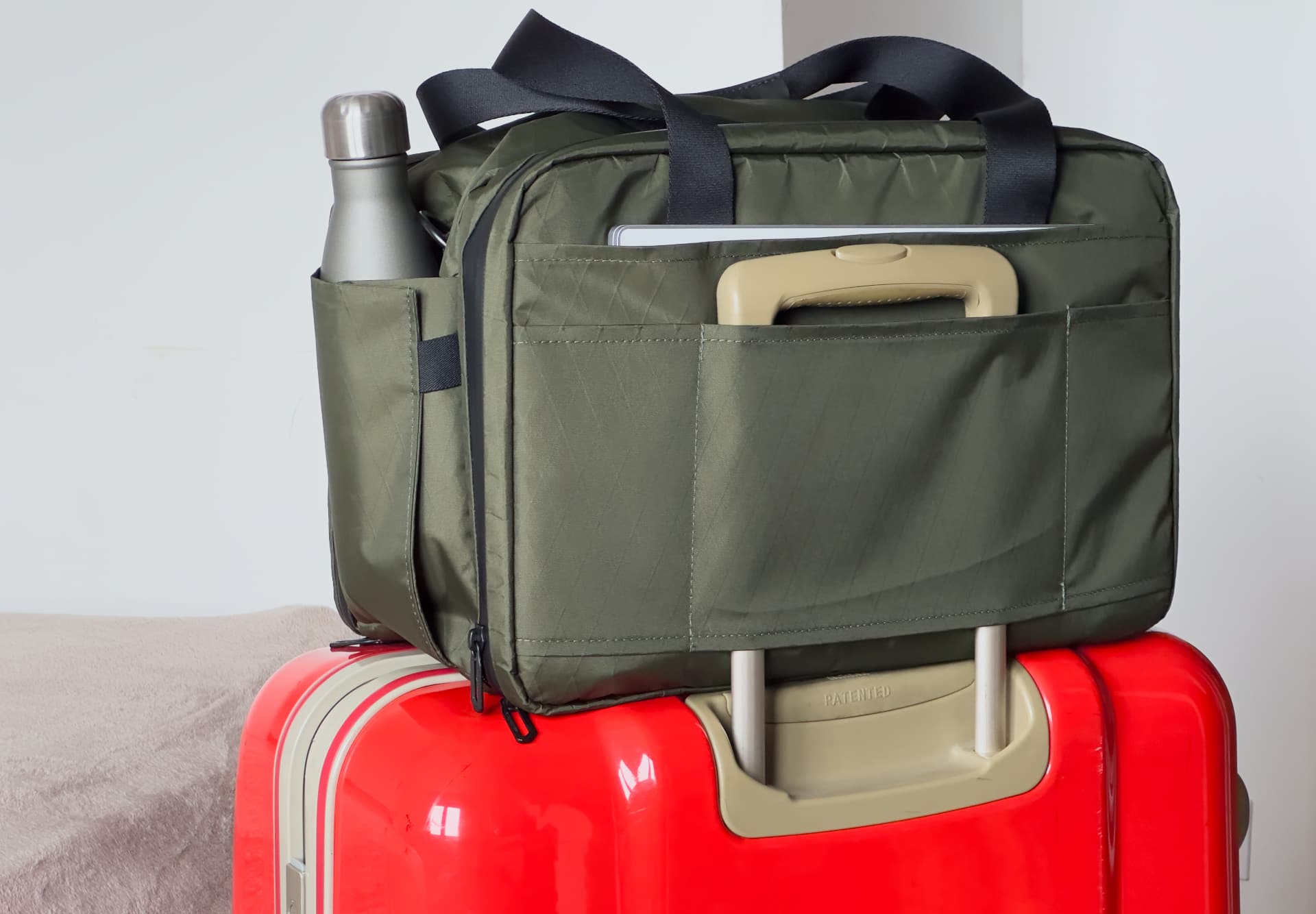 Waterfield's X-Air Duffel travel bag suitcase handle passthrough