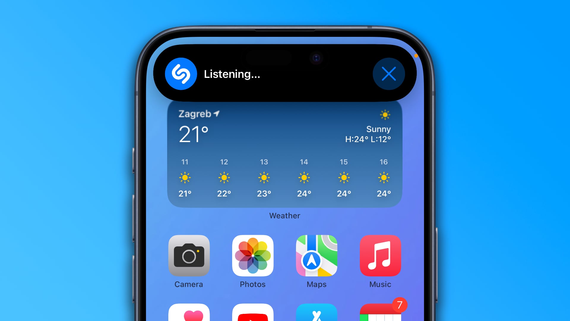 Shazam listening notification in the Dynamic Island of an iPhone, set against a blue gradient background 