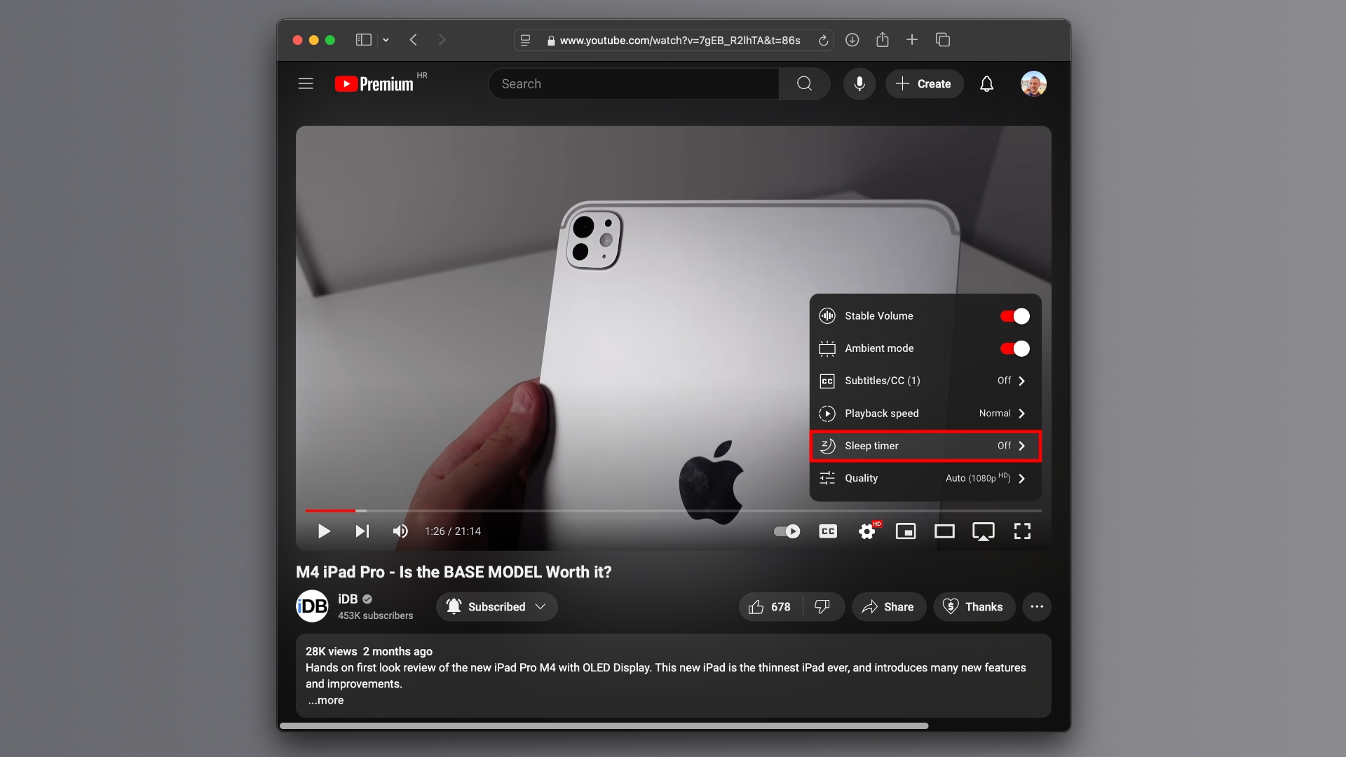 YouTube in Safari playing a video, with the Sleep Timer option selected in the playback menu.