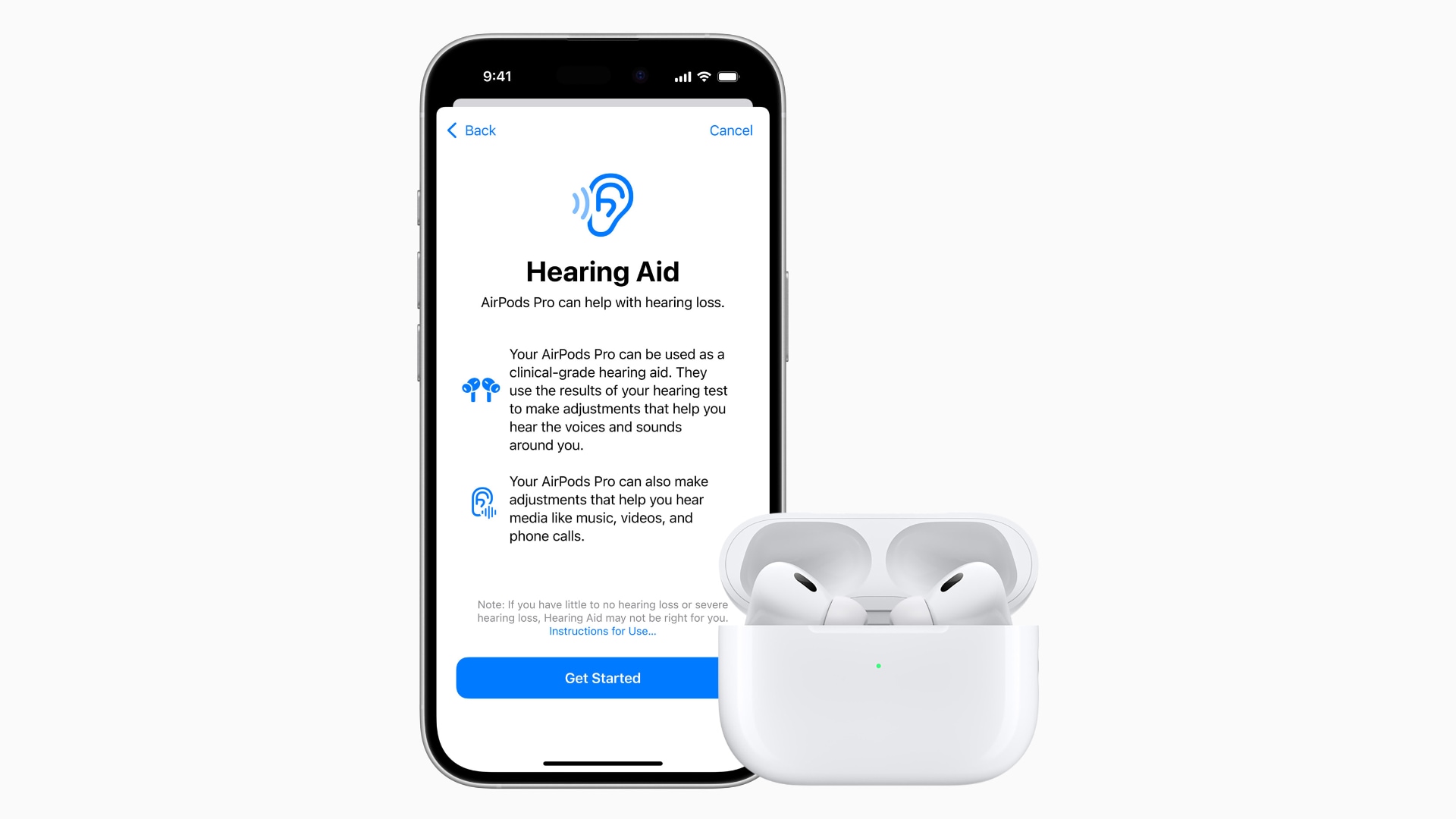 AirPods Pro 2 in their charging case with the lid open, next to an iPhone displaying a splash screen for the Hearing Aid feature.