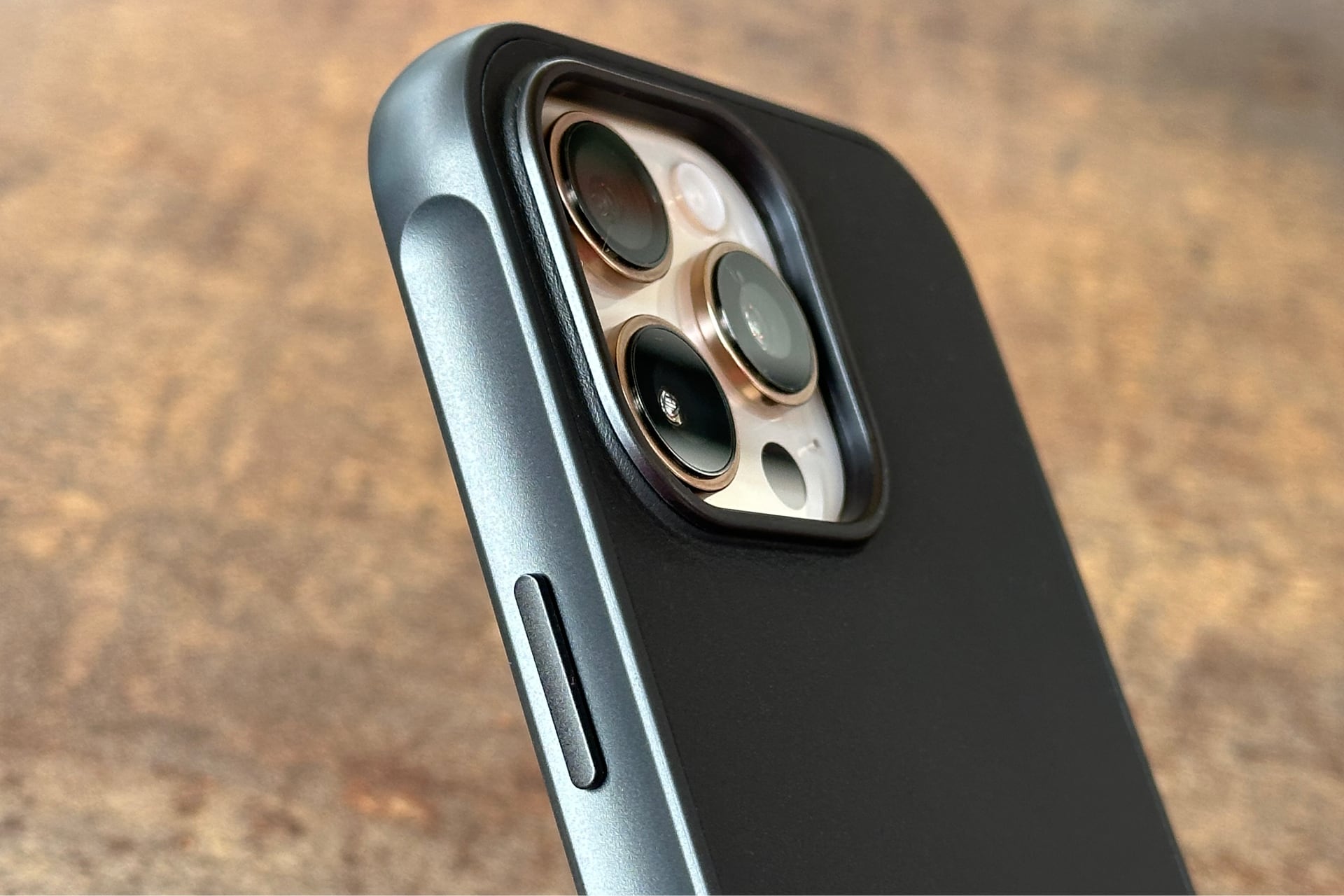 Closeup of Mujjo's ShieldCase for iPhone 16 Pro Max showcasing the power button