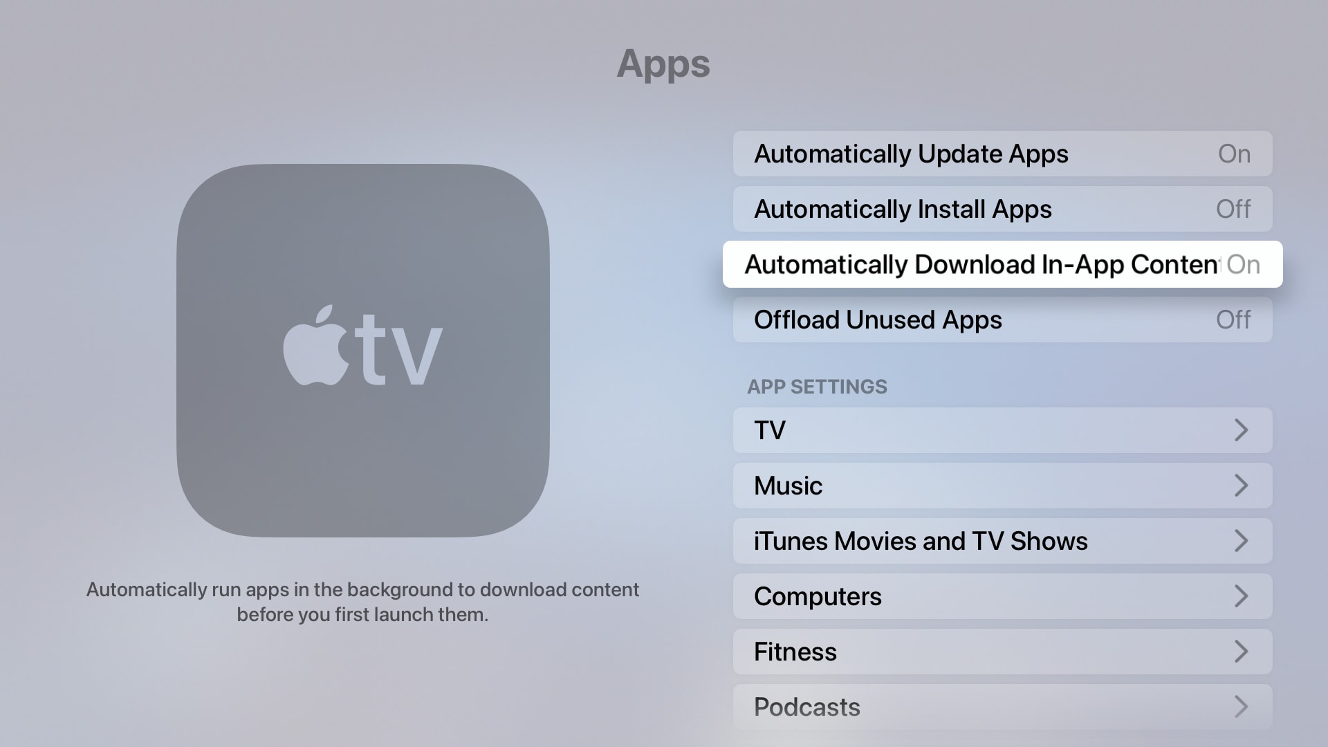 The Apps section in the Apple TV settings with the option to automatically download in-app content highlighted and turned on.