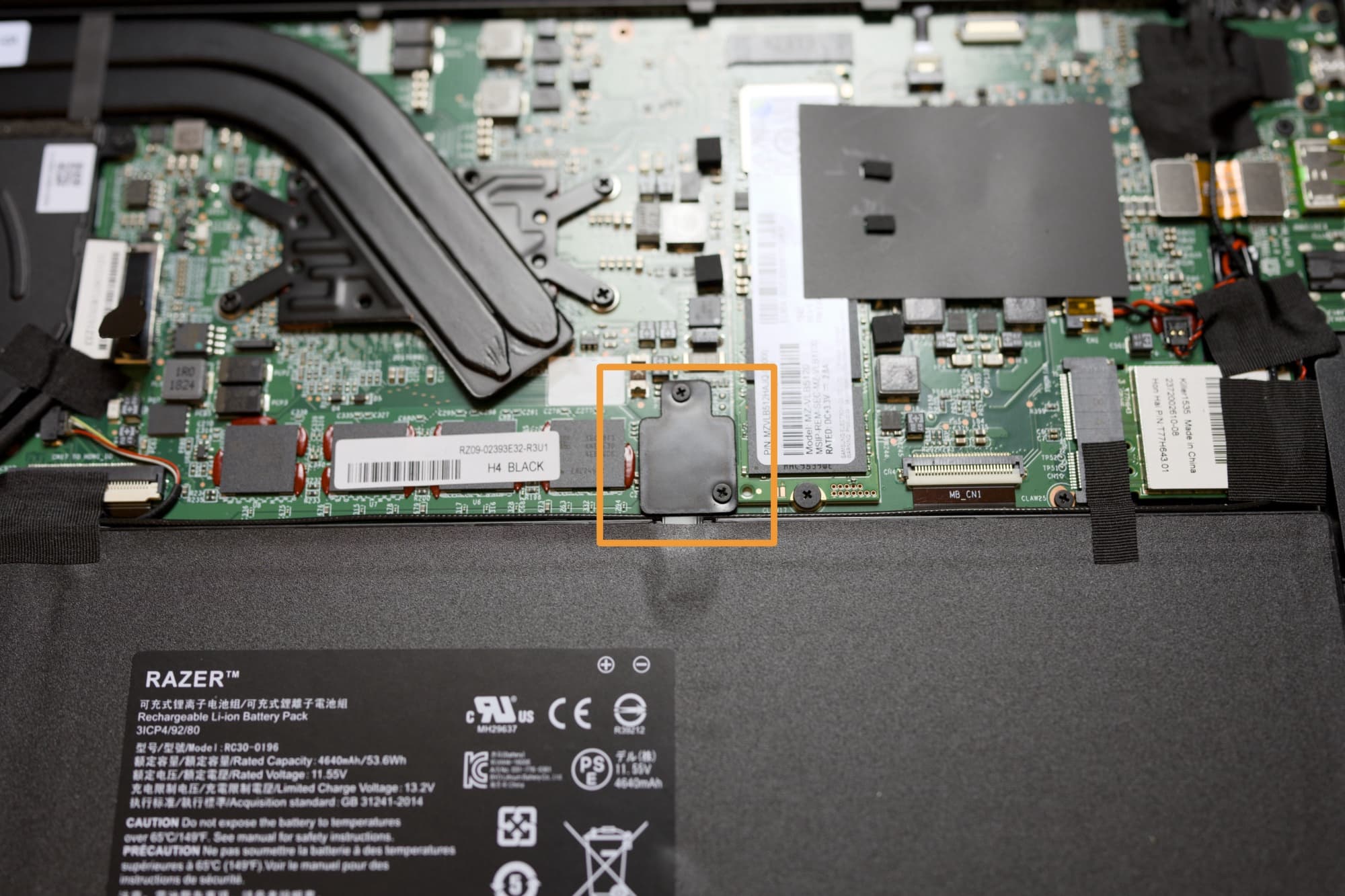 Reattach the battery connector and shield.